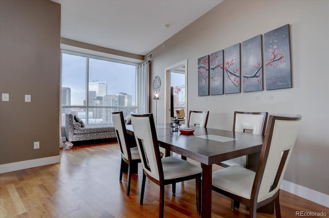 dining room featuring hardwood / wood-style flooring