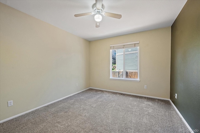 5932 S Versailles St, Aurora, CO 80015 - spare room featuring carpet floors and a ceiling fan