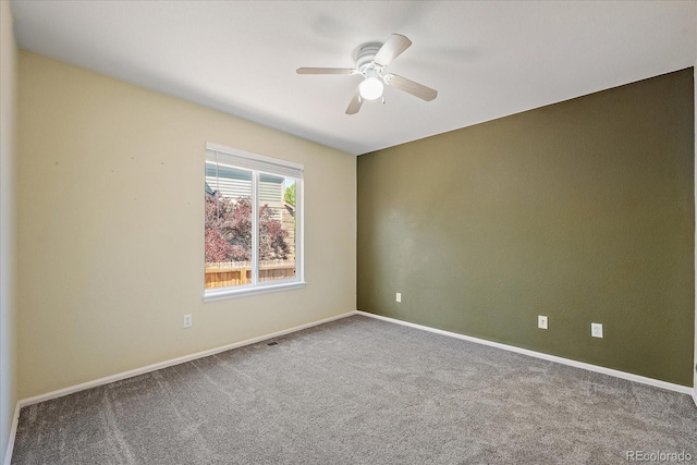 5932 S Versailles St, Aurora, CO 80015 - spare room with ceiling fan and carpet