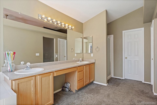 5932 S Versailles St, Aurora, CO 80015 - full bath featuring carpet floors, double vanity, and a shower with shower door