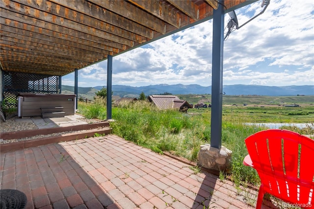1624 Gcr 5221, Tabernash, CO 80478 - view of patio featuring a hot tub and a mountain view
