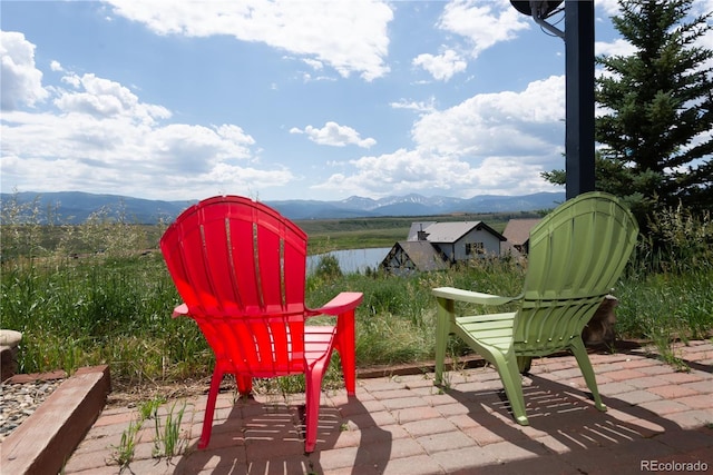 1624 Gcr 5221, Tabernash, CO 80478 - view of patio / terrace with a water and mountain view
