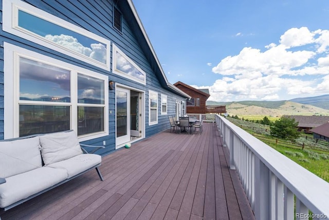 1624 Gcr 5221, Tabernash, CO 80478 - deck with outdoor dining area and a mountain view