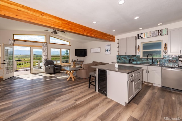 1624 Gcr 5221, Tabernash, CO 80478 - kitchen with stainless steel dishwasher, wine cooler, open floor plan, dark countertops, and dark wood-style floors