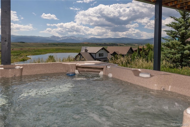 1624 Gcr 5221, Tabernash, CO 80478 - view of patio / terrace with a water and mountain view