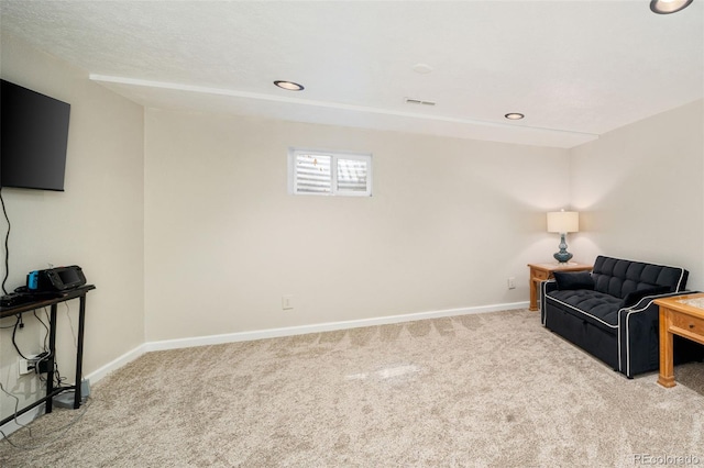 living area with recessed lighting, carpet, visible vents, and baseboards
