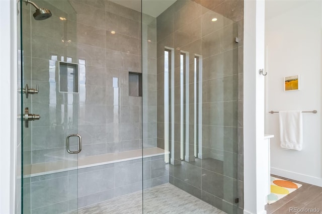 8765 Canyon Wind St, Parker, CO 80138 - bathroom featuring a stall shower and baseboards