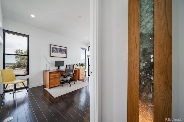 8765 Canyon Wind St, Parker, CO 80138 - home office with dark wood-style flooring and recessed lighting