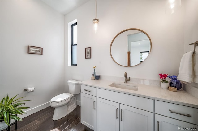 8765 Canyon Wind St, Parker, CO 80138 - half bathroom with vanity and wood finished floors