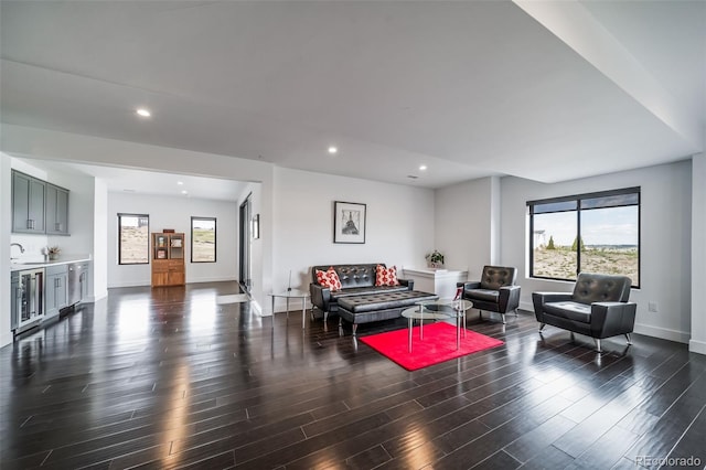 8765 Canyon Wind St, Parker, CO 80138 - living room featuring wine cooler, plenty of natural light, wood finished floors, and recessed lighting