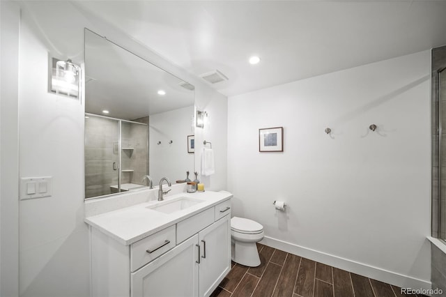 8765 Canyon Wind St, Parker, CO 80138 - full bath featuring vanity, wood finish floors, tiled shower, and recessed lighting