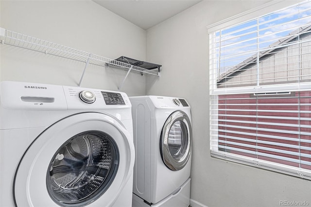 laundry area with washer and dryer