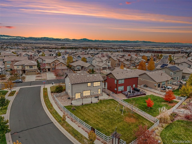 aerial view at dusk with a mountain view