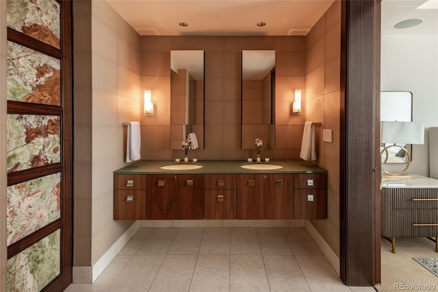 1133 14th St Unit 2000, Denver, CO 80202 - full bath featuring double vanity, tile walls, and tile patterned floors