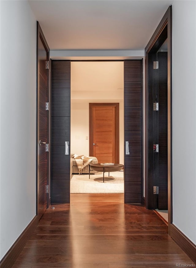1133 14th St Unit 2000, Denver, CO 80202 - hall featuring wood finished floors and baseboards