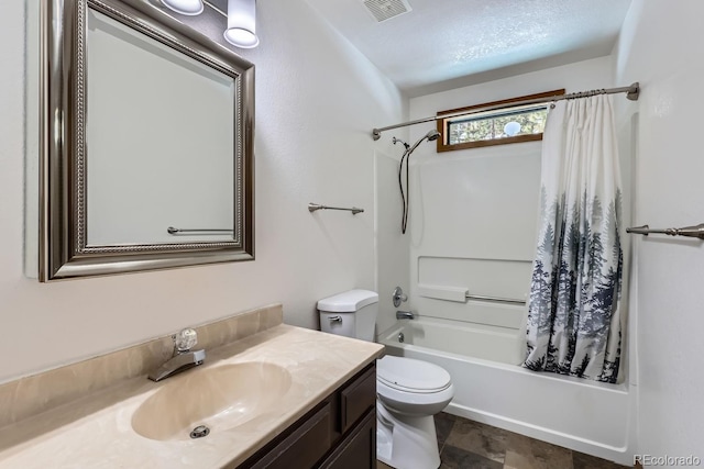 bathroom featuring visible vents, vanity, toilet, and shower / tub combo