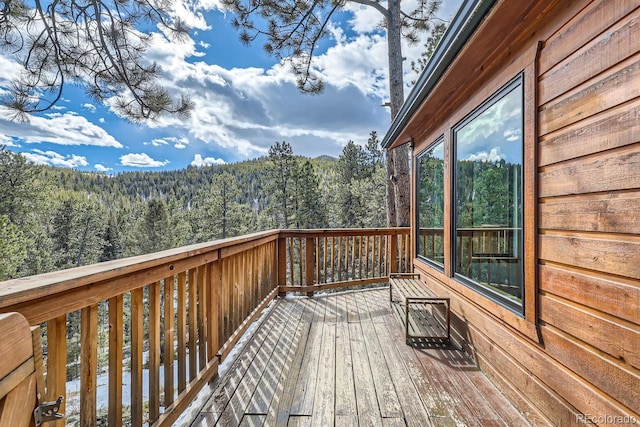 deck with a wooded view