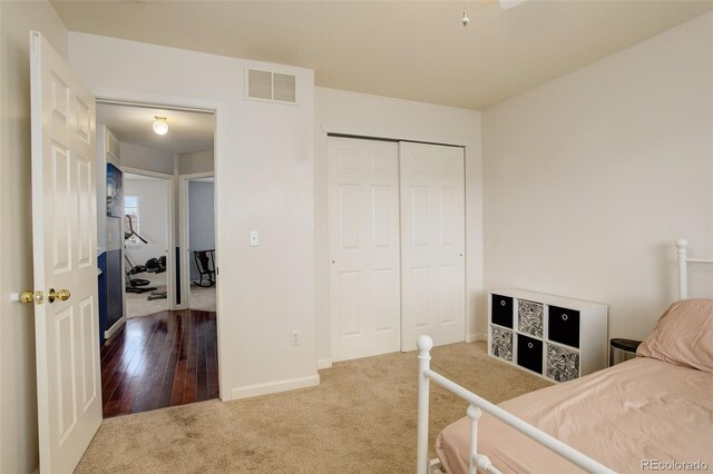 bedroom featuring a closet and hardwood / wood-style floors