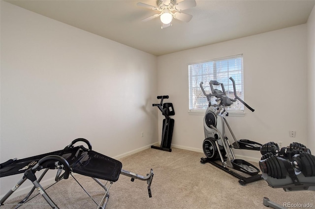 exercise area with light carpet and ceiling fan