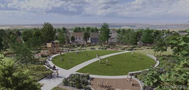 view of property's community featuring a yard