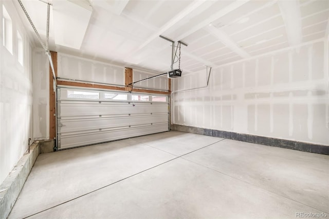 1175 Highview Dr, Erie, CO 80516 - garage with a garage door opener and baseboards