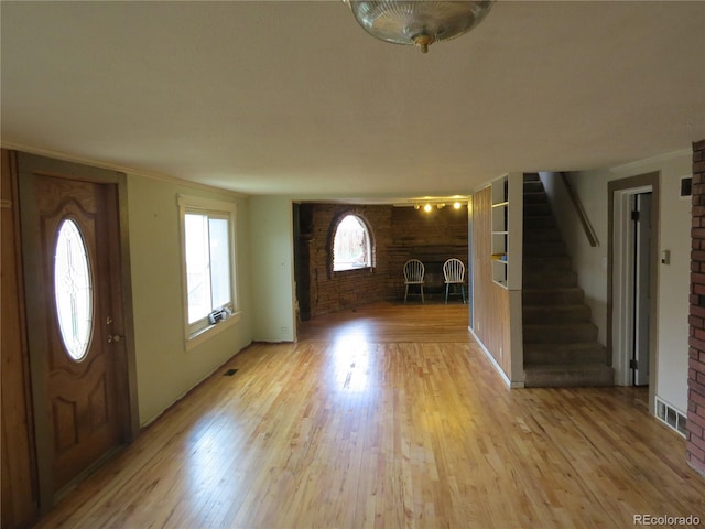 135 E 2nd St, Nederland, CO 80466 - foyer with light wood-type flooring and stairway