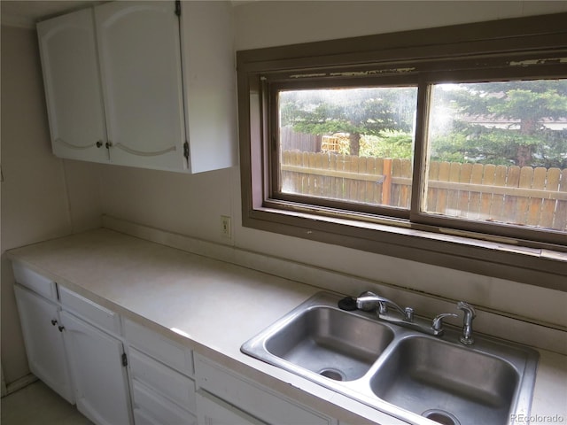 135 E 2nd St, Nederland, CO 80466 - kitchen featuring white cabinetry and light countertops