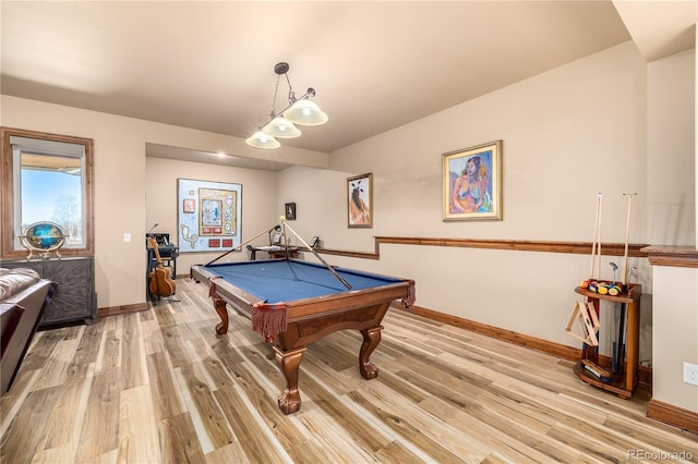 rec room with pool table and light hardwood / wood-style flooring