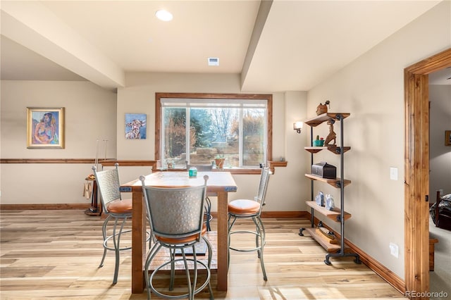 dining room featuring light hardwood / wood-style flooring