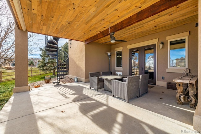 view of patio / terrace with ceiling fan and french doors