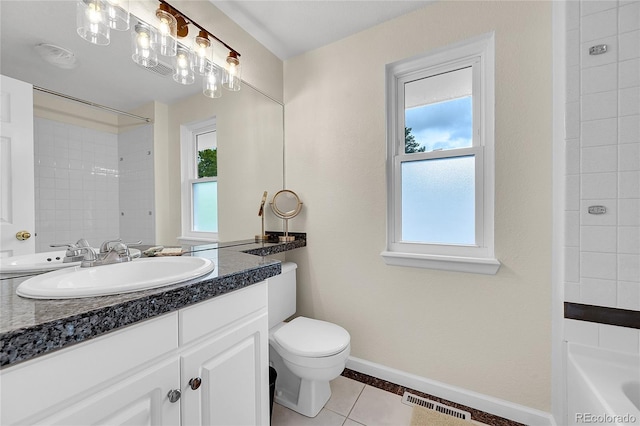 full bath with tile patterned flooring, vanity, plenty of natural light, and toilet