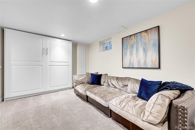 living room featuring carpet flooring and recessed lighting