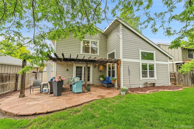 back of house featuring a pergola and a patio
