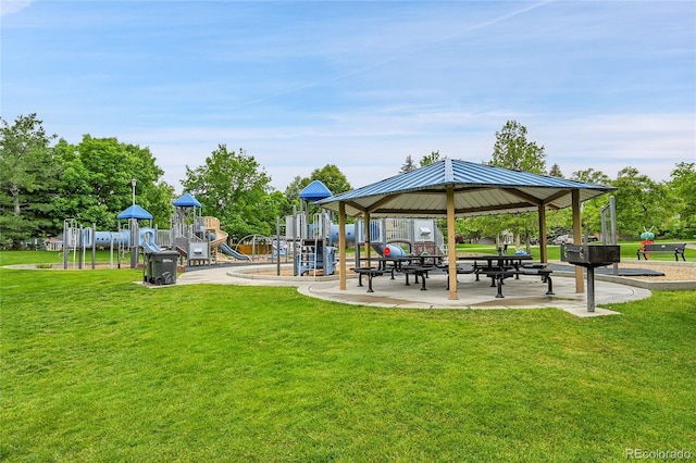 view of property's community with a gazebo and a yard