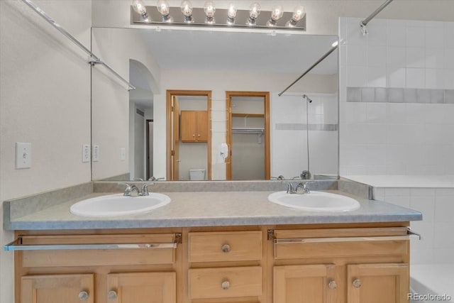 5960 S Estes St, Littleton, CO 80123 - bathroom featuring double vanity