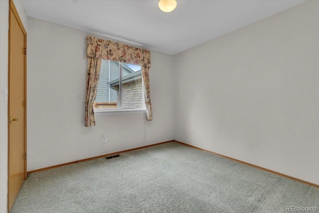 5960 S Estes St, Littleton, CO 80123 - carpeted empty room with baseboards