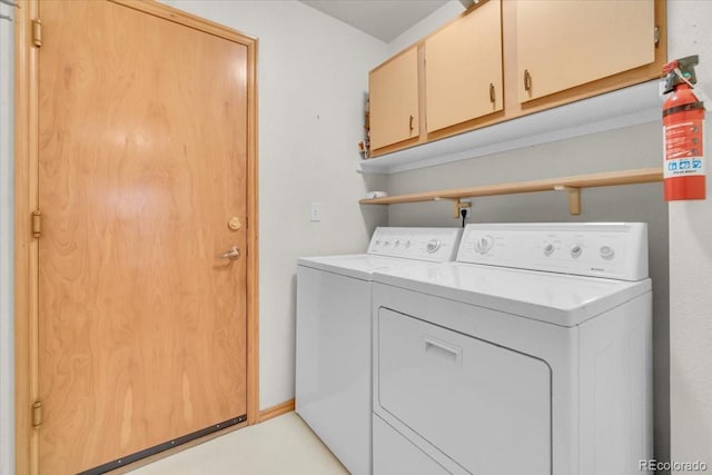 5960 S Estes St, Littleton, CO 80123 - laundry room with cabinet space and washing machine and clothes dryer