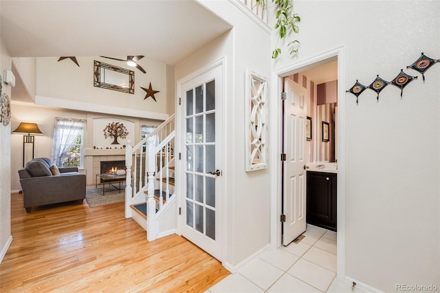 hallway with light hardwood / wood-style flooring