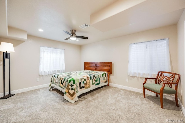 bedroom with light colored carpet and ceiling fan