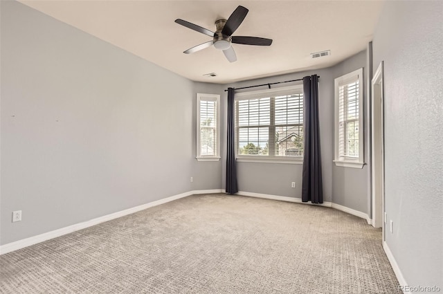 7866 Witney Pl, Lone Tree, CO 80124 - spare room featuring ceiling fan, healthy amount of natural light, and light carpet