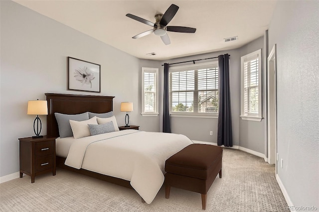 7866 Witney Pl, Lone Tree, CO 80124 - bedroom with multiple windows, light carpet, and ceiling fan
