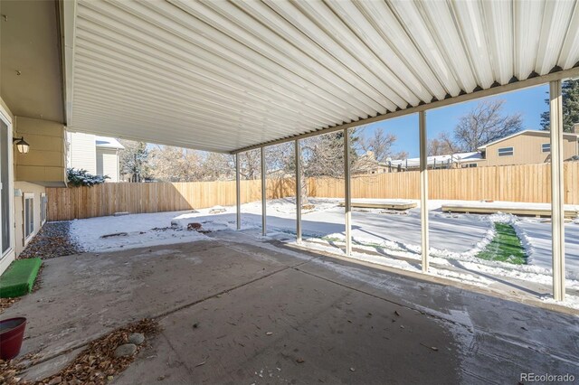 view of snow covered patio