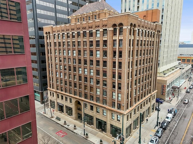view of building exterior featuring a city view