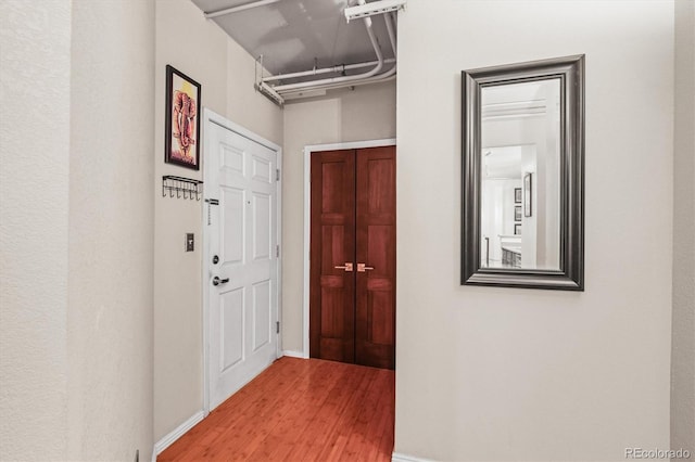 444 17th St Unit 603, Denver, CO 80202 - hallway with wood finished floors