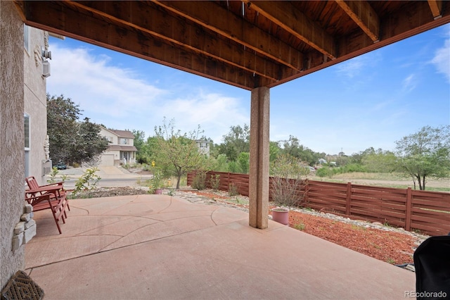 view of patio with fence