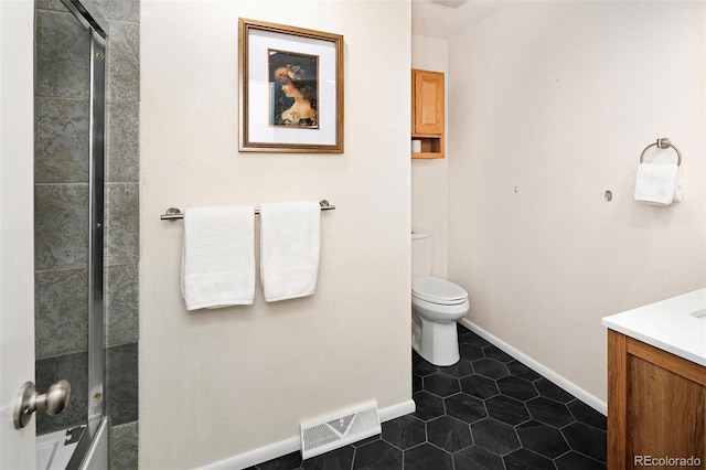 full bathroom with visible vents, baseboards, toilet, tile patterned flooring, and vanity