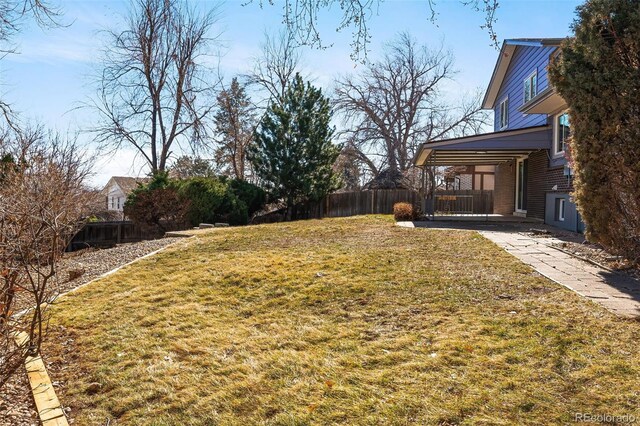 view of yard featuring fence