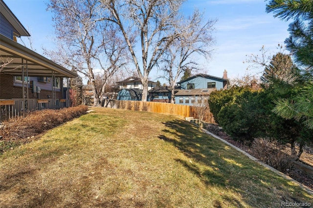 view of yard with fence