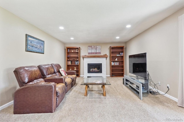 13266 Canopus Dr, Lone Tree, CO 80124 - carpeted living area featuring baseboards, recessed lighting, and a glass covered fireplace