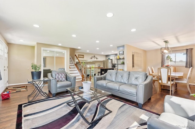 13266 Canopus Dr, Lone Tree, CO 80124 - living room with stairs, wood finished floors, recessed lighting, and baseboards